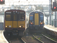 314202+314215 at Glasgow Central