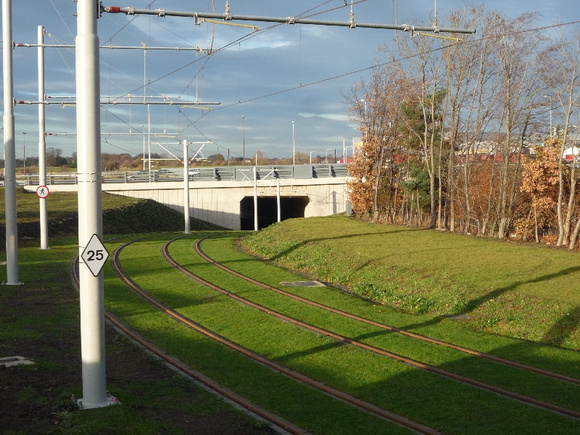 Grassed track curve and underpass at Gyle tram stop