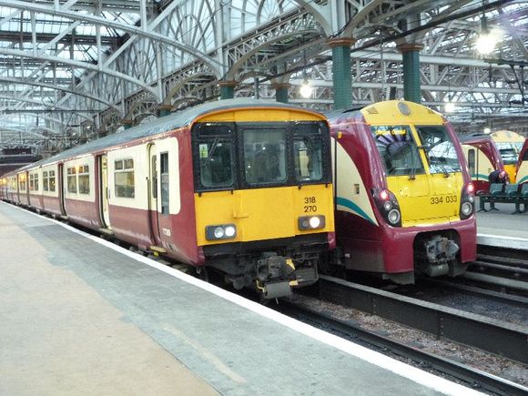 318270 and 334033 at Glasgow Central