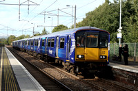 318250+318261 at Coatbridge Central