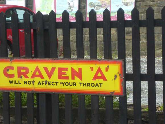 Advertising board at Oakworth Station
