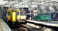 156499 and 314207 at Glasgow Central