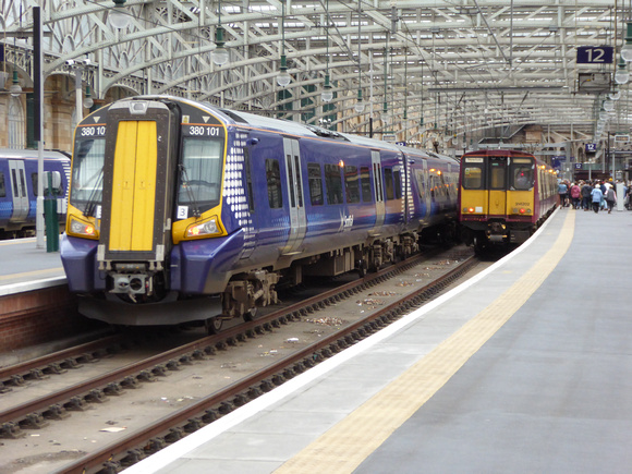 380101 and 314202 at Glasgow Central