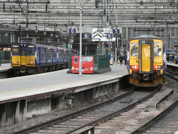 314214 and 156495 at Glasgow Central