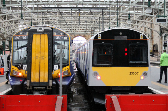 380110 and 230001 at Glasgow Central