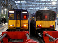314209 and 318257 at Glasgow Central