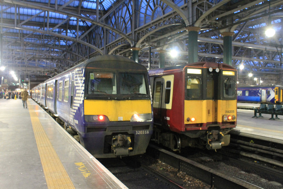 320318 and 314205 at Glasgow Central