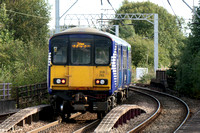 318250+318261 at Coatbridge Central